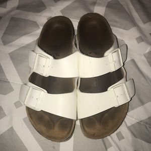 Birkenstock white leather sandals.